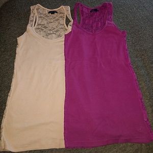 2 razorback tank tops